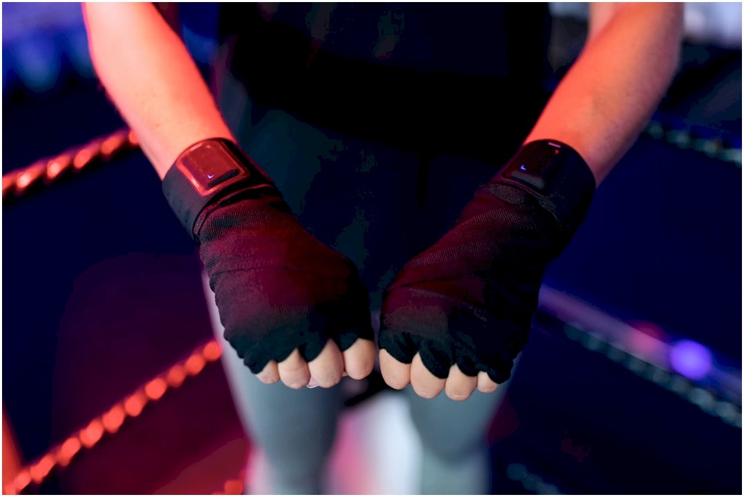 person wearing black socks and red rubber band