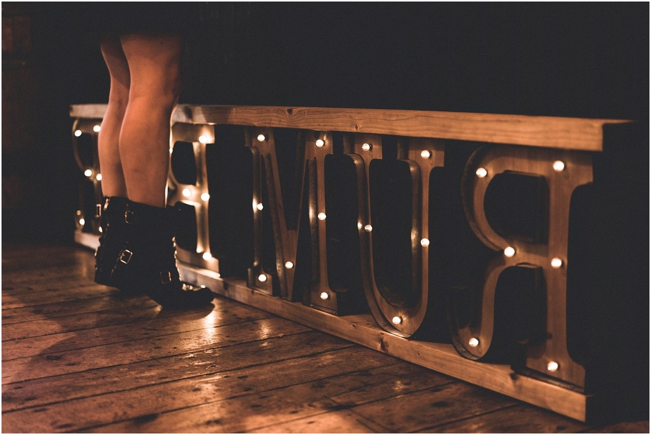 people, woman, boots, lights, text, feet, knee