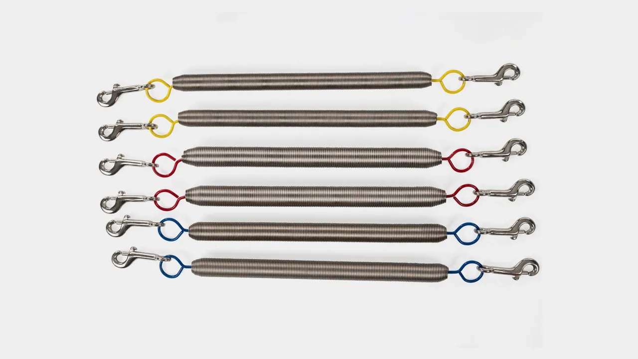 Molas de Pilates com ganchos metálicos e codificação por cores para uso em equipamentos do tipo Cadillac