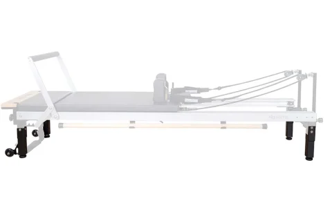 Pernas elevatórias instaladas em um Reformer de Pilates
