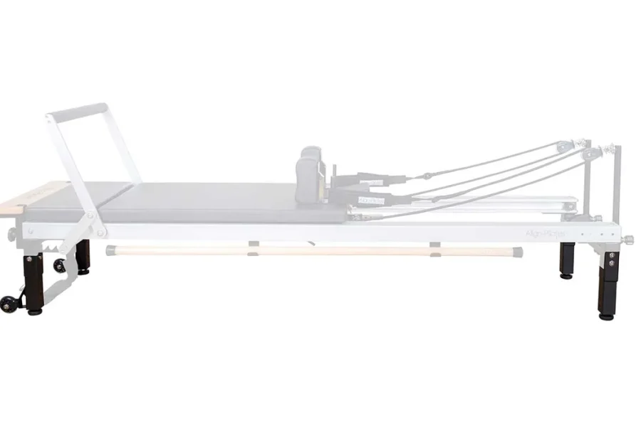 Pernas elevatórias instaladas em um Reformer de Pilates